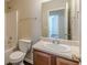 Bathroom featuring a vanity with a sink, toilet, and a shower-tub combination at 330 Kentwood Springs Dr, Hampton, GA 30228