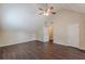 Bedroom features vaulted ceilings, wood flooring, ceiling fan and 2 doors at 330 Kentwood Springs Dr, Hampton, GA 30228