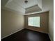 Comfortable bedroom featuring hardwood floors, neutral paint, and a bright window at 330 Kentwood Springs Dr, Hampton, GA 30228