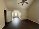 Bedroom with high ceilings, wood-look flooring, and a window at 330 Kentwood Springs Dr, Hampton, GA 30228