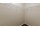 Spacious walk-in closet featuring wire shelving for optimal storage solutions at 330 Kentwood Springs Dr, Hampton, GA 30228