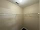Large walk-in closet with ample shelving and storage space for an organized wardrobe at 330 Kentwood Springs Dr, Hampton, GA 30228