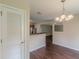Dining area with views to the kitchen area with convenient pass-through window at 330 Kentwood Springs Dr, Hampton, GA 30228