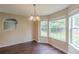 Cozy dining area featuring large windows and an elegant chandelier at 330 Kentwood Springs Dr, Hampton, GA 30228