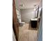 Bathroom featuring tile floors and a vanity at 4506 Town Crier Sw Rd, Lilburn, GA 30047