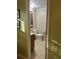 Bathroom featuring tile floors and a vanity at 4506 Town Crier Sw Rd, Lilburn, GA 30047