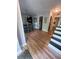Dining room with hardwood floors and a chandelier at 4506 Town Crier Sw Rd, Lilburn, GA 30047