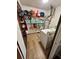 Laundry room with shelving at 4506 Town Crier Sw Rd, Lilburn, GA 30047