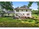 Spacious backyard with a patio and outdoor seating, perfect for entertaining at 5290 River Mill Cir, Marietta, GA 30068