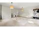 Large bonus room features neutral carpet, white paneled walls, recessed lighting, and access to backyard at 5290 River Mill Cir, Marietta, GA 30068