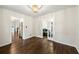 Dining room with hardwood flooring and double doors leading to a sitting area at 5290 River Mill Cir, Marietta, GA 30068