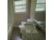 Bathroom with granite countertop vanity, toilet and tub and shower combination at 5924 Central Church Rd, Douglasville, GA 30135