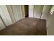 Bedroom featuring neutral walls, closet, and carpeted floor at 5924 Central Church Rd, Douglasville, GA 30135