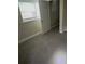 Bedroom featuring neutral walls, a window, and carpeted floor at 5924 Central Church Rd, Douglasville, GA 30135