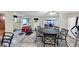 Spacious basement is finished with drum set, dining area, and access to the living room and backyard at 10400 Groomsbridge Rd, Alpharetta, GA 30022