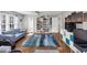 Bright bedroom with a blue couch, and an area rug at 10400 Groomsbridge Rd, Alpharetta, GA 30022