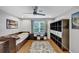 Bedroom with a ceiling fan, a large closet and hardwood floors at 10400 Groomsbridge Rd, Alpharetta, GA 30022