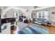 Bright bedroom with a vaulted ceiling, a ceiling fan and hardwood floors at 10400 Groomsbridge Rd, Alpharetta, GA 30022
