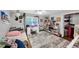 Bedroom with a desk, an area rug and hardwood floors at 10400 Groomsbridge Rd, Alpharetta, GA 30022