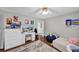 Bedroom with a vanity, an area rug and hardwood floors at 10400 Groomsbridge Rd, Alpharetta, GA 30022