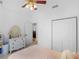 Bedroom features a dresser, and closet at 1585 Lake Dow Rd, Mcdonough, GA 30252