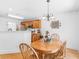 Charming breakfast nook connected to the kitchen with a wooden table and a view at 1585 Lake Dow Rd, Mcdonough, GA 30252