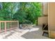 Wood back deck overlooking the yard of this lovely home; great for entertaining or relaxing at 2012 Variations Ne Dr, Atlanta, GA 30329