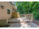 The wood back deck features wood railings and offers an additional outdoor space for this home at 2012 Variations Ne Dr, Atlanta, GA 30329