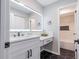 Modern bathroom with vanity, large mirror, and tiled shower/tub combination at 2012 Variations Ne Dr, Atlanta, GA 30329