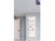 Bathroom view with subway tile shower, modern vanity, and illuminated mirror at 2012 Variations Ne Dr, Atlanta, GA 30329