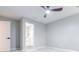 This bedroom features a neutral color palette and includes an ensuite bathroom at 2012 Variations Ne Dr, Atlanta, GA 30329