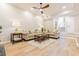 A bright living room features wood floors, neutral paint, and two sofas for ample seating at 2012 Variations Ne Dr, Atlanta, GA 30329