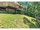 Expansive backyard with a multi-level deck and screened porch, ideal for outdoor living and entertaining at 1311 Cobblemill Nw Way, Kennesaw, GA 30152