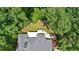 Aerial view of a deck overlooking backyard with mature trees providing privacy at 1311 Cobblemill Nw Way, Kennesaw, GA 30152