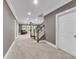 Finished basement featuring carpeted floors and a staircase at 1311 Cobblemill Nw Way, Kennesaw, GA 30152