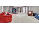 Spacious basement featuring a golf simulator and ample room for relaxation and entertainment at 1311 Cobblemill Nw Way, Kennesaw, GA 30152