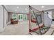 Finished basement featuring a golf simulator for practice in your free time at 1311 Cobblemill Nw Way, Kennesaw, GA 30152