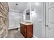 Bathroom featuring a stone wall, walk-in shower, and tile floors at 1311 Cobblemill Nw Way, Kennesaw, GA 30152