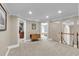 Large bonus room with neutral carpet, multiple doorways, and an arched doorway, providing a spacious feel at 1311 Cobblemill Nw Way, Kennesaw, GA 30152
