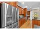 The kitchen has stainless steel appliances, and hardwood floors at 1311 Cobblemill Nw Way, Kennesaw, GA 30152
