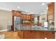 Beautiful kitchen with granite countertops, stainless steel appliances, and ample cabinet space at 1311 Cobblemill Nw Way, Kennesaw, GA 30152