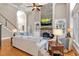 Spacious living room with fireplace, staircase, and abundant natural light perfect for Gathering gatherings at 1311 Cobblemill Nw Way, Kennesaw, GA 30152