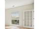 Bright bedroom with window and exterior door at 2921 Lenox Rd # 308, Atlanta, GA 30324