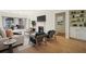 Bright living room features fireplace, comfortable seating, and a view to the outdoor area at 2921 Lenox Rd # 308, Atlanta, GA 30324