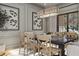 Close up of a dining room featuring a rectangular table with seating for six and neutral decor at 3629 Centerville Rosebud Rd, Snellville, GA 30039