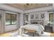 Tranquil main bedroom with neutral tones, natural light, and a decorative ceiling design at 3629 Centerville Rosebud Rd, Snellville, GA 30039