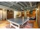 Finished basement with a ping pong table, beanbag chairs, and wooden shelving at 4020 N Cooper Lake Se Rd, Smyrna, GA 30082
