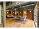 Finished basement with wood paneled walls and a ping pong table at 4020 N Cooper Lake Se Rd, Smyrna, GA 30082