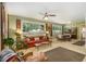 Spacious living room with large windows, comfortable seating, and dining area at 4020 N Cooper Lake Se Rd, Smyrna, GA 30082