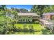 A lush backyard view with a spacious lawn, perfect for outdoor activities, surrounded by mature trees at 437 Eastland Dr, Decatur, GA 30030